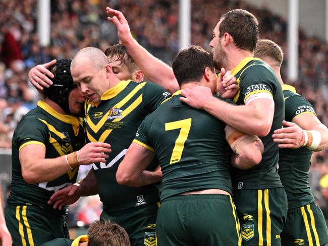 CHRISTCHURCH, NEW ZEALAND - OCTOBER 27: Australia celebrate a try scored by Zac Lomax during the men's 2024 Rugby League Pacific Championships match between New Zealand Kiwis and Australian Kangaroos at Apollo Projects Stadium on October 27, 2024 in Christchurch, New Zealand. (Photo by Joe Allison/Getty Images)