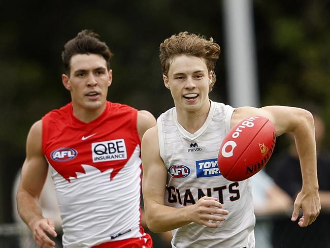 Giants Cody Angove and Sydney's Errol Gulden during the AFL practice match between the Sydney Swans and GWS Giants at Tramway Oval on February 21, 2025. Photo by Phil Hillyard (Image Supplied for Editorial Use only - **NO ON SALES** - Â©Phil Hillyard )