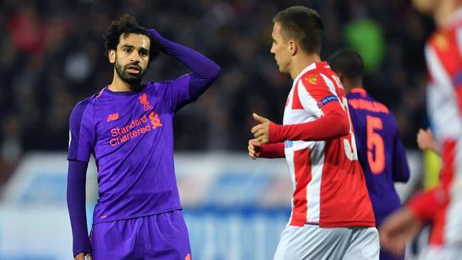 Head scratcher … Liverpool's Egyptian forward Mohamed Salah (left) reacts during Liverpool’s shock 2-0 UEFA Champions League Group C loss to Red Star Belgrade. Photo: AFP