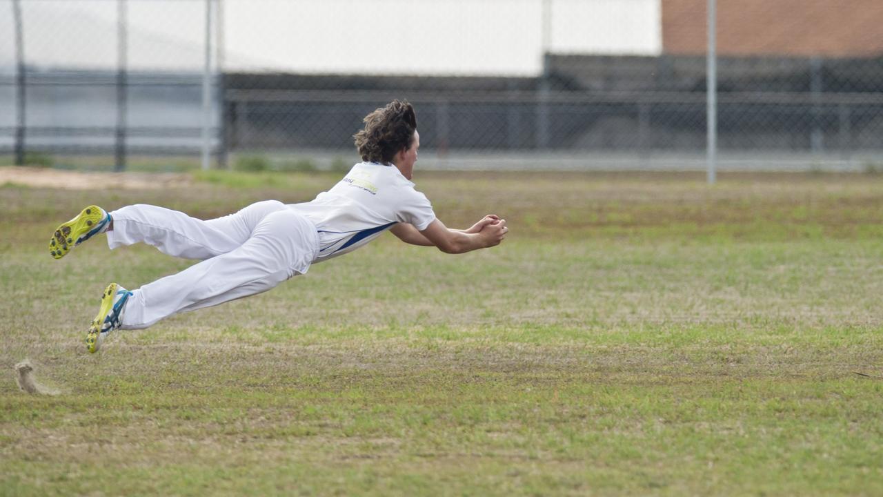 Tully Wilson takes a catch for University.