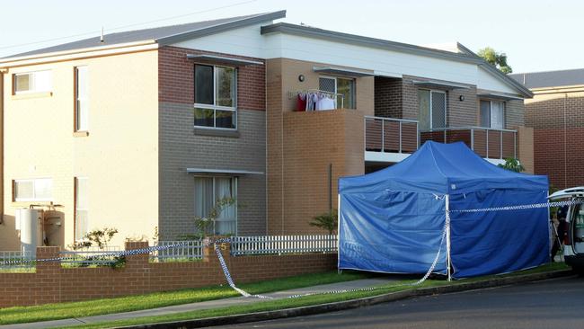 Investigations outside the unit block where Valmai Birch’s body was found on March 21, 2011.