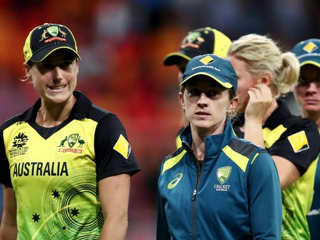 Ellyse Perry of Australia and Rachel Haynes of Australia look dejected after losing the ICC Women's T20 Cricket World Cup match between Australia and India. Picture: Cameron Spencer/Getty Images