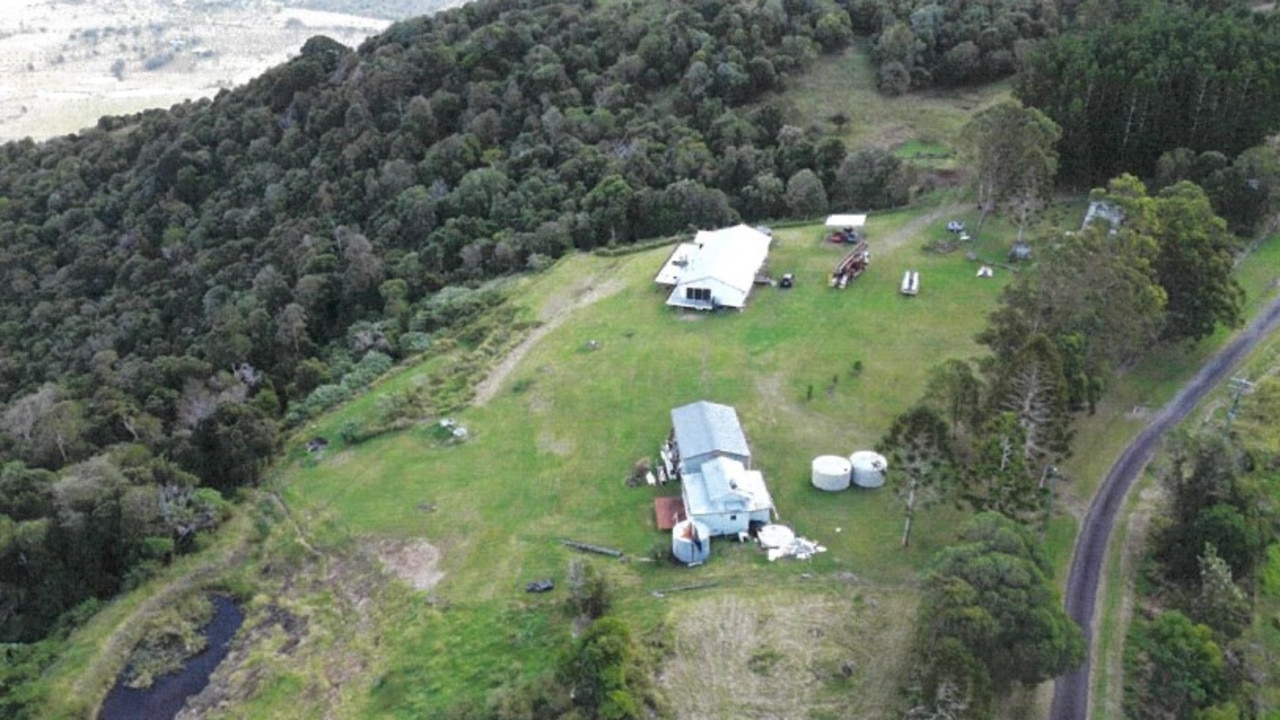 A house and sheds are the only structures sitting on the block at the moment, and an “environmental rainforest” sits atop the mountain.