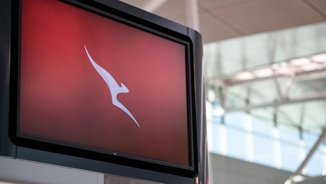 Qantas signage seen at Sydney Airport. Extension of borders closures is a setback for Australia’s tourism sector, experts warn. Picture: James Gourley/AAP