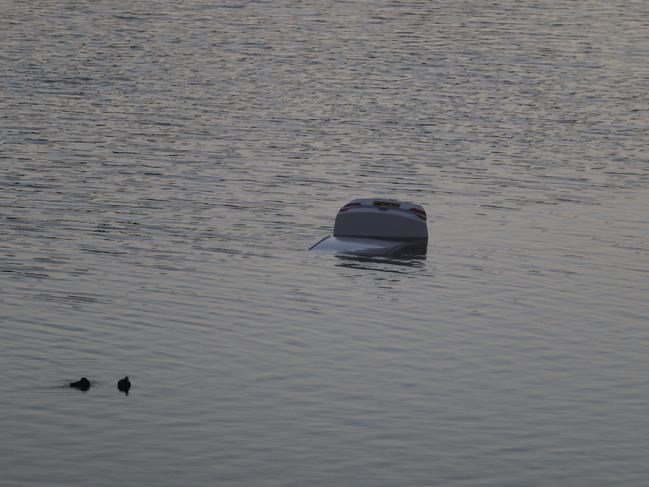 Police divers searched the water as a precaution after a car was found floating in the Nepean River on Thursday.