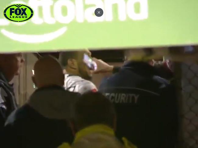 The Manly fan during a confrontation with Chambers. Picture: https://twitter.com/FOXNRL