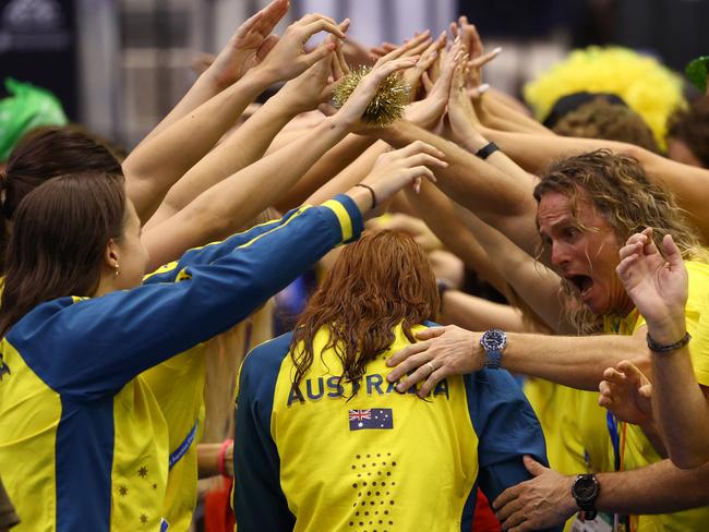 The Australian swim team celebrates in Fukuoka. Picture: Clive Rose/Getty Images.