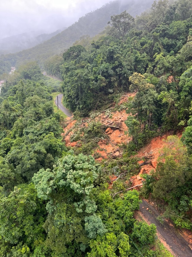 Landslide wipes out power poles as rain delays Ergon’s efforts