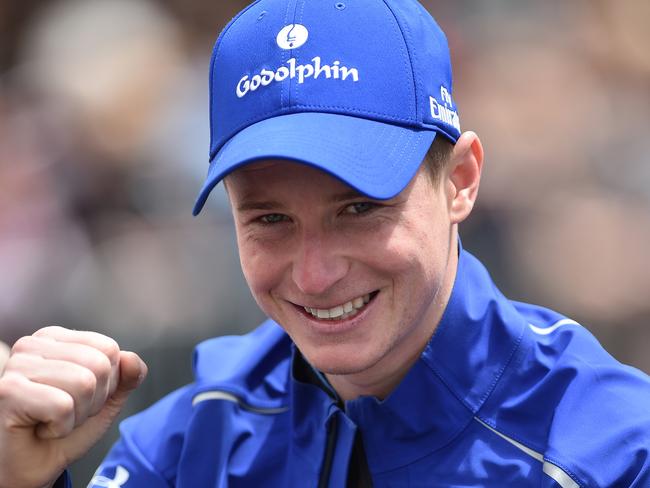 Jockey James McDonald, who will be riding the favourite Hartnell, is seen during the Melbourne Cup parade in Melbourne, Monday, Oct. 31, 2016. The $AUD6.2 million Melbourne Cup, the world's richest handicap, is tomorrow. (AAP Image/Julian Smith) NO ARCHIVING