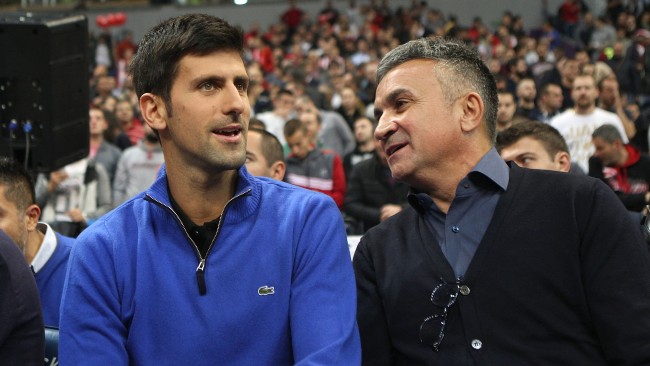 Novak Djokovic's father Srdjan Djokovic (R) has said the world number one wants to play in the Australian Open. Picture: Getty Images