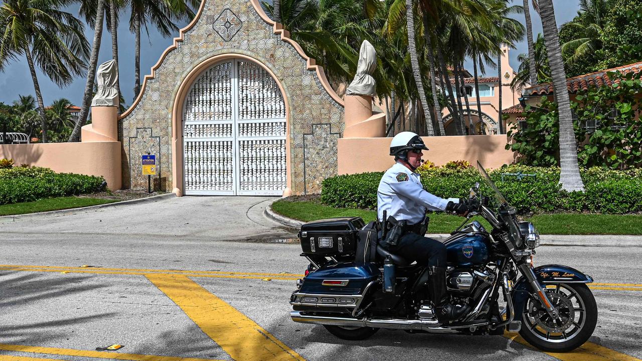 Local law enforcement remain outside Mar-a-Lago in Palm Beach, Florida. Picture: AFP