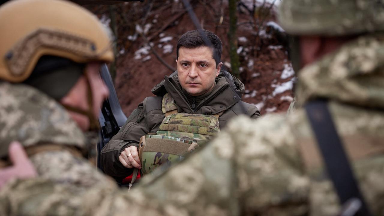 Ukrainian President Volodymyr Zelensky visits combat positions and meets with servicemen at the frontline with Russia-backed separatists in the Donetsk region on December 6, 2021. Picture: AFP PHOTO / Ukrainian presidential press-service / handout "