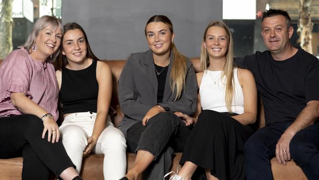 Michelle and Brent Milthorpe pose for a photo with their daughters, Rose, Maggie and Pippa. Picture: NewsWire / Monique Harmer