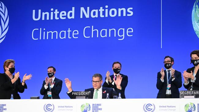 President Alok Sharma receives applause after giving the closing speech as he attends the Closing Plenary of the COP26 Climate Summit over the weekend. Picture: Getty Images