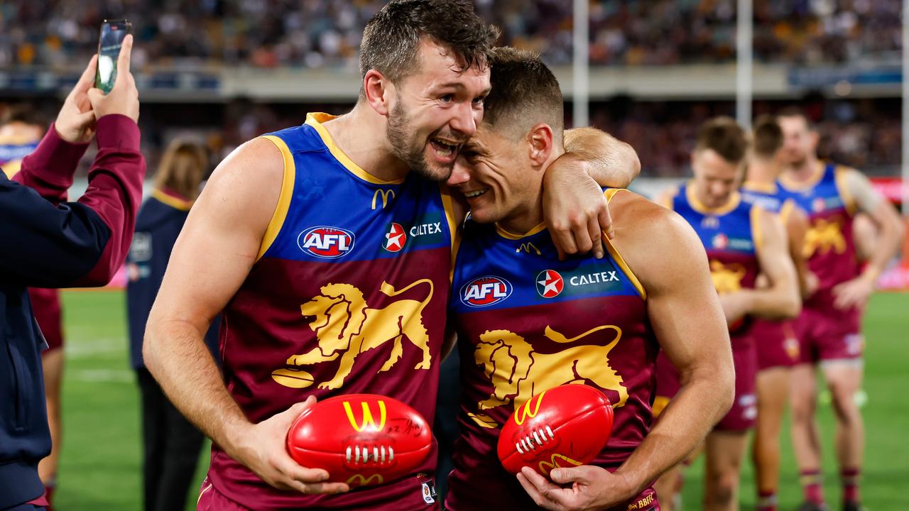 Dayne Zorko (left) has been through the best and worst of times with the Lions. Picture: Dylan Burns/AFL Photos via Getty Images