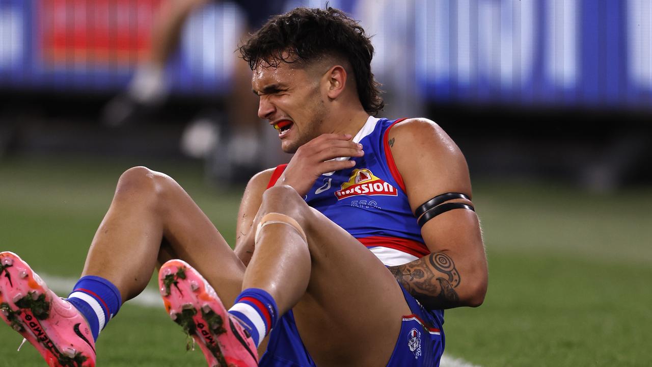 MELBOURNE, AUSTRALIA - SEPTEMBER 06: Jamarra Ugle-Hagan of the Bulldogs grabs at his shoulder during the AFL Second Elimination Final match between Western Bulldogs and Hawthorn Hawks at Melbourne Cricket Ground, on September 06, 2024, in Melbourne, Australia. (Photo by Darrian Traynor/AFL Photos/via Getty Images)