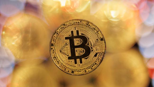 LONDON, ENGLAND - JANUARY 09: In this photo illustration, a visual representation of the digital Cryptocurrency, Bitcoin is seen on January 09, 2024 in London, England. Bitcoin investors are expecting the U.S. Securities And Exchange Commission (SEC) to issue a decision soon on whether to grant Bitcoin "exchange-traded fund" (ETF) approval, which would allow people to invest in Bitcoin without having to buy it on a crypto exchange like Coinbase or Binance. The price of Bitcoin has risen in anticipation of such approval. (Photo illustration by Dan Kitwood/Getty Images)