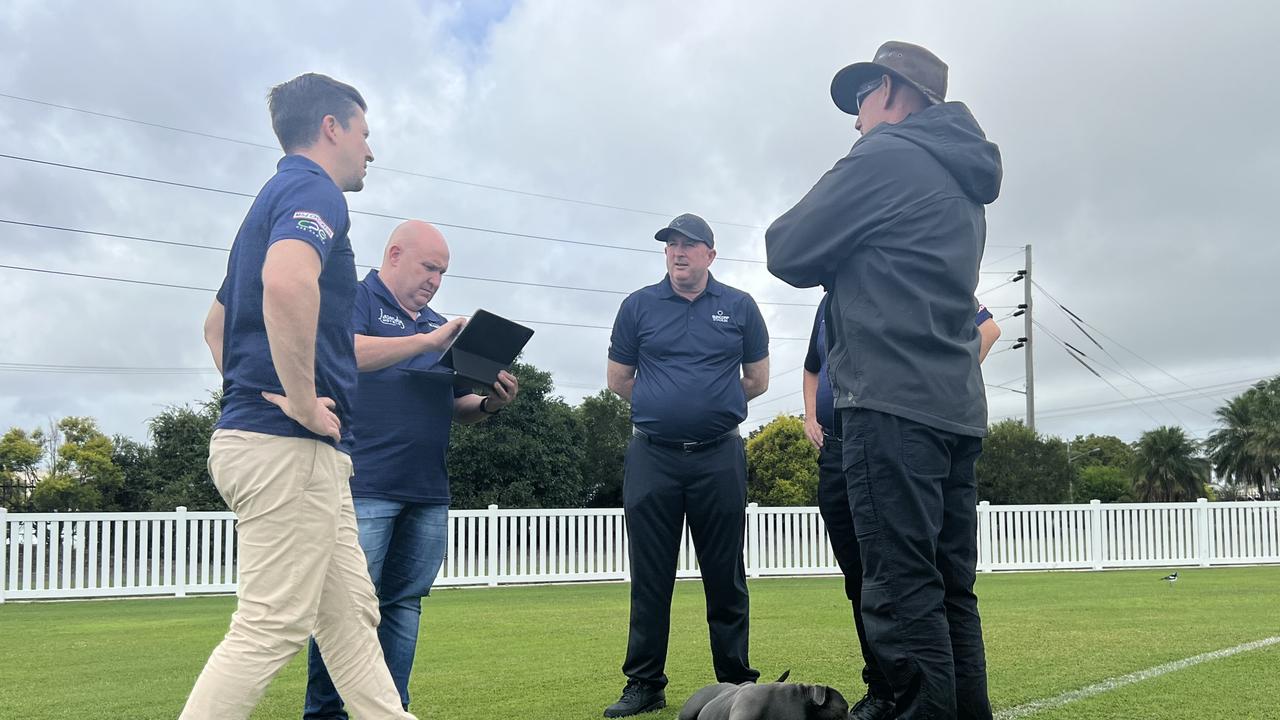 Canterbury Bulldogs CEO, Aaron Warburton, Team Manager Stephen Litvensky, Director Andrew Gifford, Suncorp Stadium Curator Mal Caddies and the groundsman for Bundaberg's Salter Oval inspect the playing ground before the Bulldogs and Cowboys match on August 7.