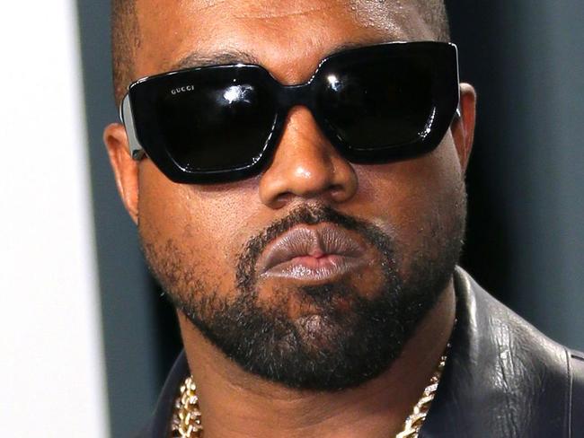 (FILES) In this file photo taken on February 9, 2020 Kanye West attends the 2020 Vanity Fair Oscar Party following the 92nd annual Oscars at The Wallis Annenberg Center for the Performing Arts in Beverly Hills. - US rapper and apparent presidential candidate Kanye West has in the past opened up about his struggles with bipolar disorder. But his recent erratic behavior has again called into question his health and treatment. He launched his election campaign on July 19, 2020 with a rambling speech that saw him rant incoherently, reveal he had wanted to abort his daughter, and break down in tears. (Photo by Jean-Baptiste Lacroix / AFP)