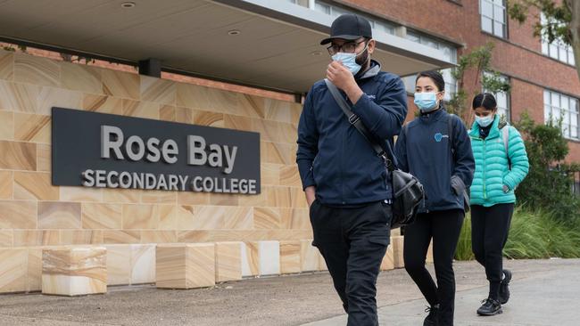 Cleaning workers outside Rose Bay Secondary College on June 29. Picture: NCA NewsWire / James Gourley