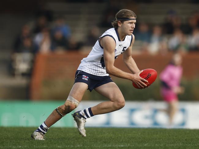 MELBOURNE, AUSTRALIA - JUNE 10: Harry Morphet of Victoria Country looks to pass the ball during the AFL National Development Championships U16 match between Victoria Country and Victoria Metro at Trevor Barker Beach Oval on June 10, 2023 in Melbourne, Australia. (Photo by Daniel Pockett/AFL Photos/via Getty Images)