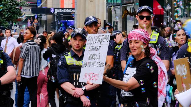 Pro-Palestinian protestors along Bourke St Mall. Picture: NewsWire / Luis Enrique Ascui