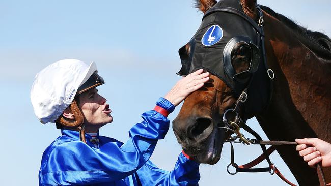 Craig Williams celebrates with Best Of Days after its win in the Kennedy Mile. Picture: Getty Images