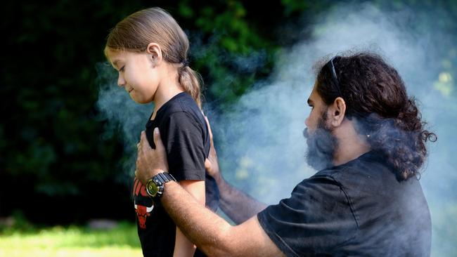 Jiritju Fourmile led the Land Court of Queensland on a tour of his traditional lands and told the court ecological demise caused by climate change was a threat to his culture and ability to pass on lore to his daughter Armina Fourmile. Photo: Isaac McCarthy