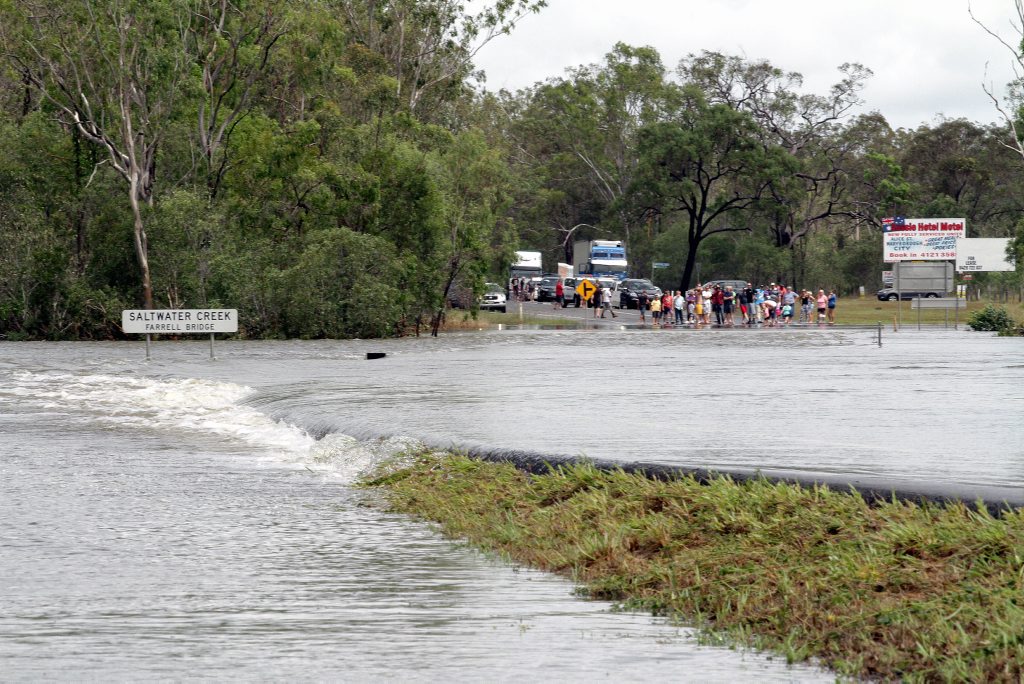 Motorists starnded on the Maryborough side of Saltwater Creek on nthe Bruce Highway. Photo: Robyne Cuerel / Fraser Coast Chronicle. Picture: Robyne Cuerel