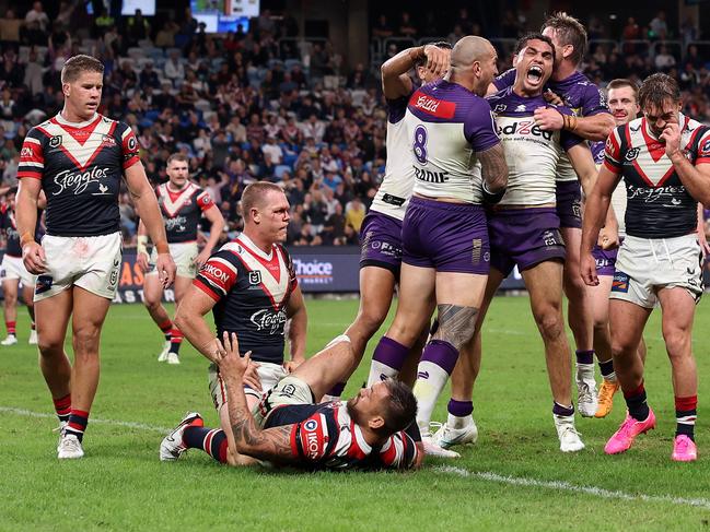 SYDNEY, AUSTRALIA - APRIL 18:  Xavier Coates of the Storm celebrates with team mates after scoring a try during the round seven NRL match between Sydney Roosters and Melbourne Storm at Allianz Stadium on April 18, 2024, in Sydney, Australia. (Photo by Cameron Spencer/Getty Images)