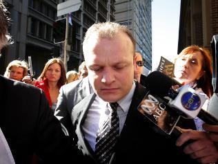 It's over ... Mark Wilhelm leaving court with his legal team / Pic: Stephen Cooper