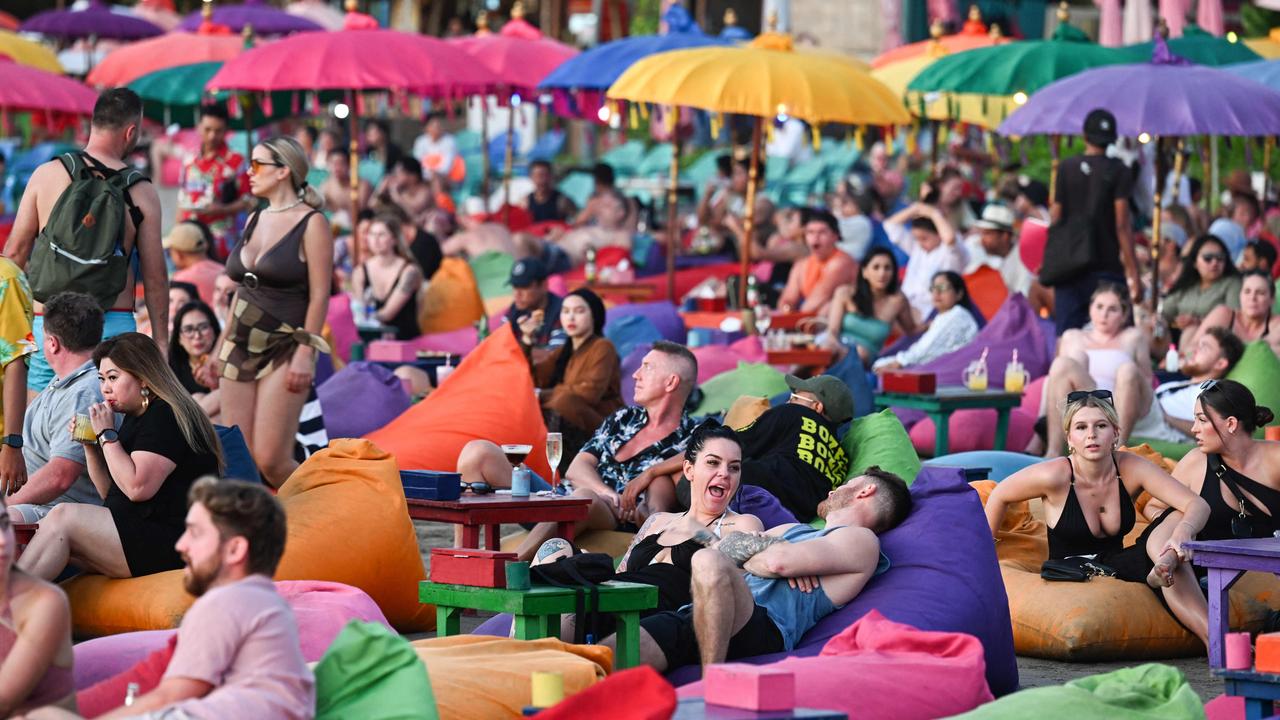 Bali is expecting an influx of tourists this holiday season and is urging them to behave. Picture: Sonny Tumbelaka / AFP