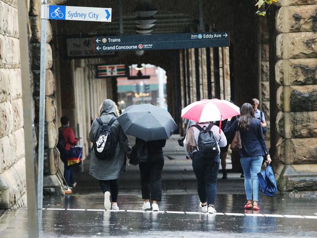 Commuters return to work at Central Station on Monday. Picture: John Feder