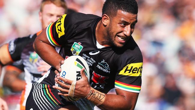 Viliame Kikau runs the ball for the Panthers.