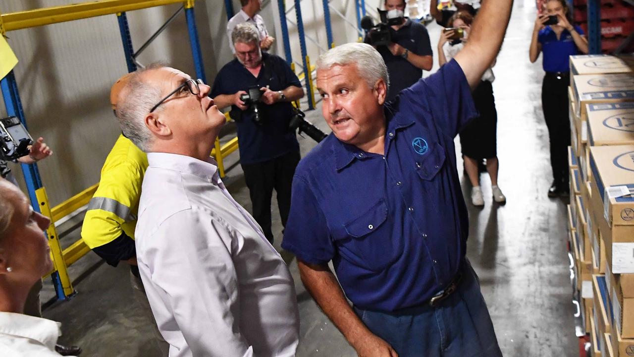 Prime Minster Scott Morrison visits Nolan Meats, Gympie, after devastating floods. Pictured with Terry Nolan. Photo: Patrick Woods.