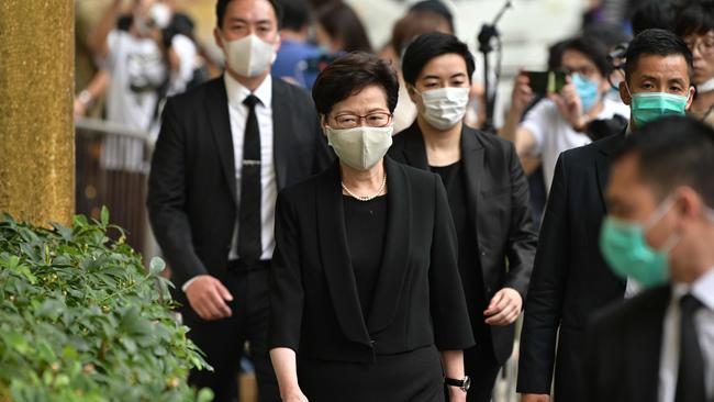 Hong Kong Chief Executive Carrie Lam (C) arrives for the funeral of late Macau tycoon Stanley Ho in Hong Kong. Picture: AFP.