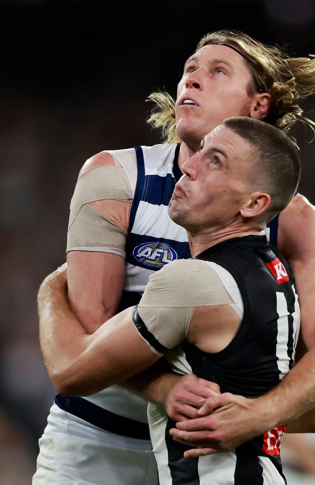 Blicavs jostles with Magpie big man Darcy Cameron. Picture: Dylan Burns/AFL Photos via Getty Images