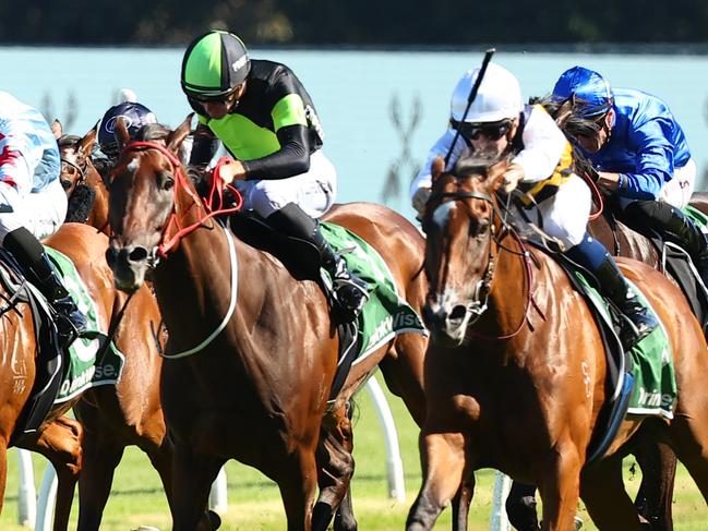 SYDNEY, AUSTRALIA - MARCH 09: Tyler Schiller riding Lady Laguna wins Race 7 James Squire Canterbury Stakes during "The Agency Randwick Guineas Day" -  Sydney Racing at Royal Randwick Racecourse on March 09, 2024 in Sydney, Australia. (Photo by Jeremy Ng/Getty Images)