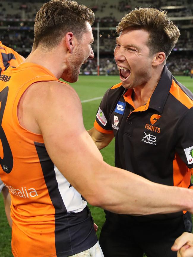 Toby Greene celebrates the Giants’ preliminary final win with Daniel Lloyd. Picture. Phil Hillyard