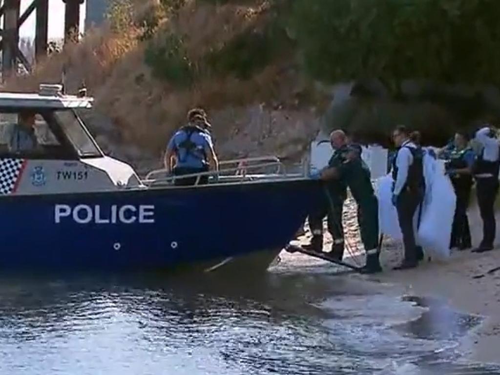 Police at the scene of the fatal shark attack. Picture 9News