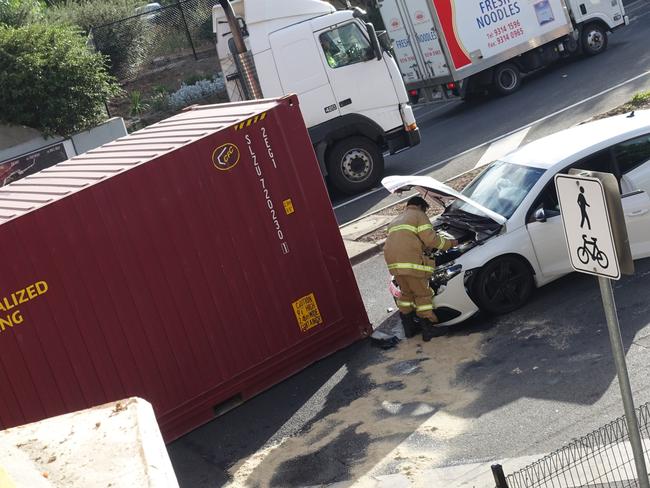 A fireman inspects the damage. Picture: Martin Wurt