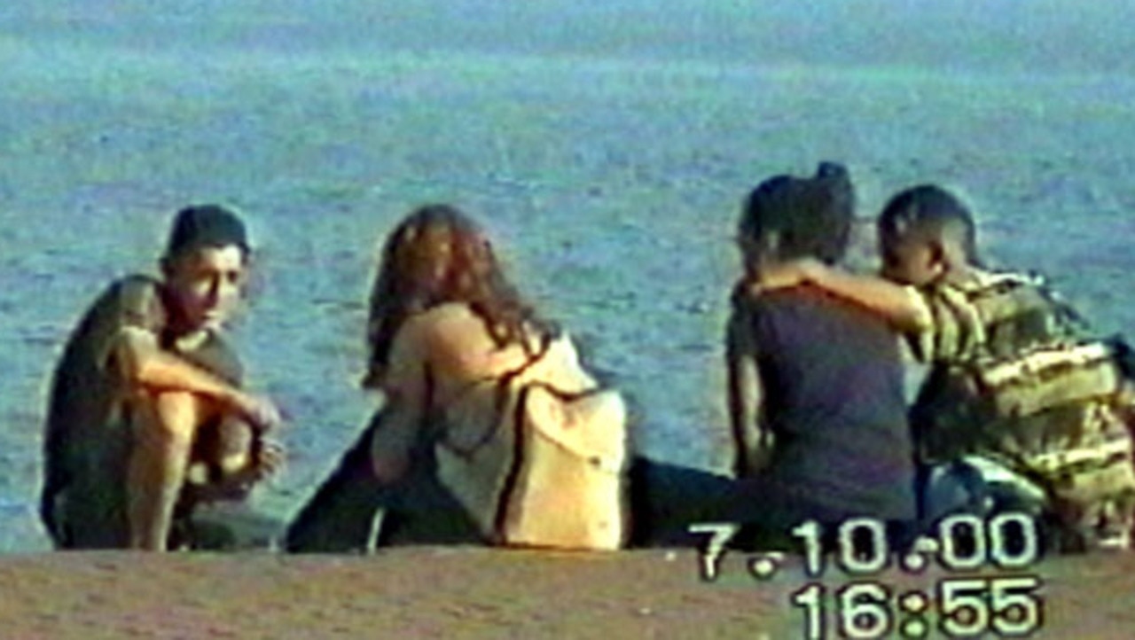 Gang rapists Mohammed Skaf (left) and Tayyab Sheikh (right) with girls on Bondi Beach in October 2000 before their arrest.