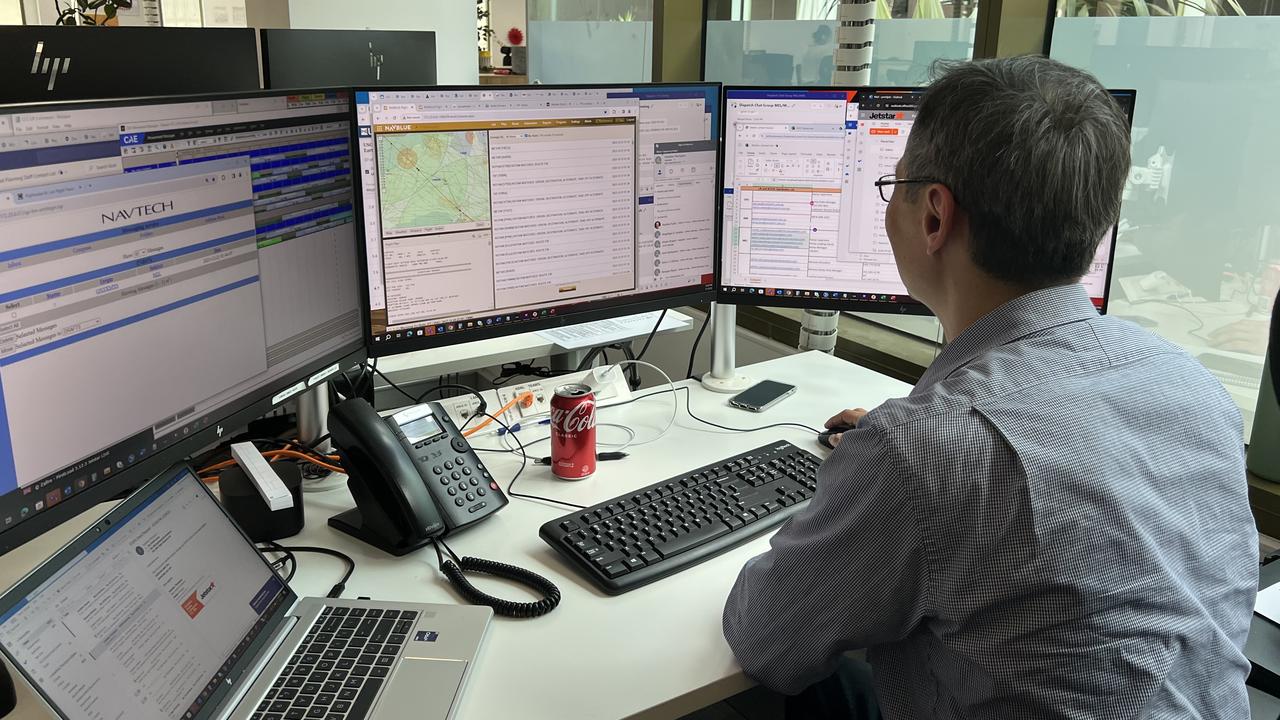 The flight dispatch team in the JOCC communicate with the pilots, with one of their roles being to determine the flight path each aircraft will take. Picture: news.com.au