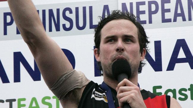 Ryan Lonie grabbing his best afield medal in the 2009 grand final.