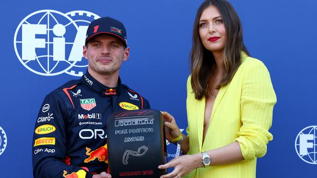 Max Verstappen presented with the Pirelli Pole Position Award by Maria Sharapova. Photo by Mark Thompson/Getty Images.