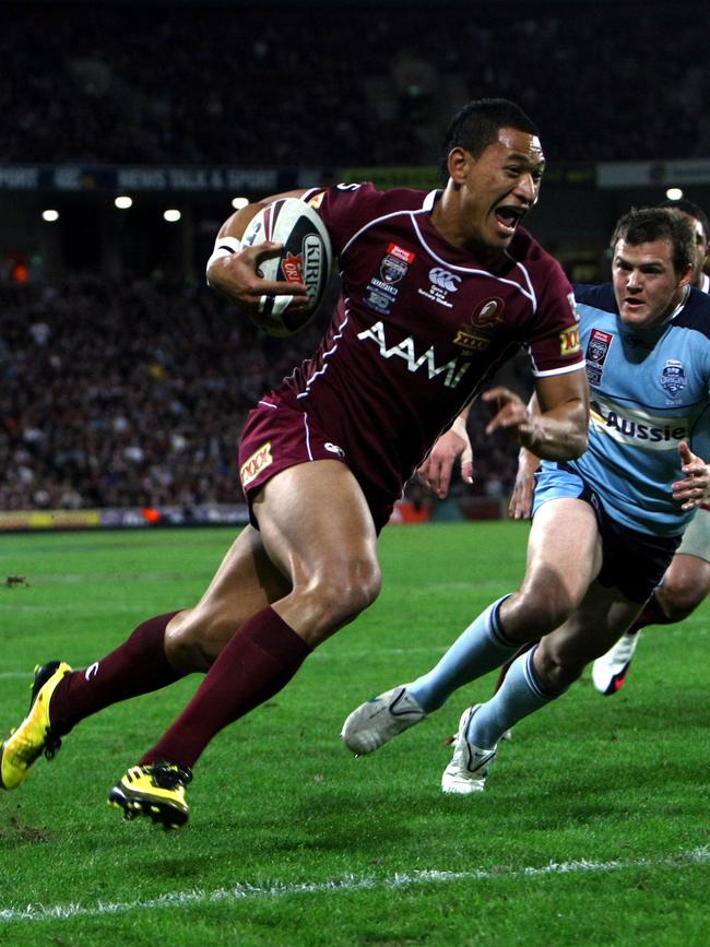 Israel Folau celebrates as he crosses for a try for Queensland in the second game of the 2010 State of Origin series. Picture: Michael Ross