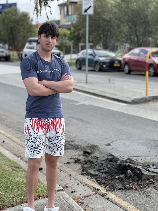 Local resident Thomas Amico, 18, said the pothole in front of his house had been an ongoing issue for almost two years. Picture: Canterbury-Bankstown Express