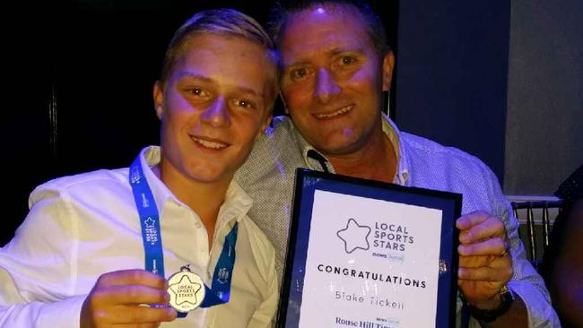 A delighted Blake Tickell with his dad Darren with Rouse Hill Times JSS Award at Epping Club on November 2. Picture: Lawrence Machado