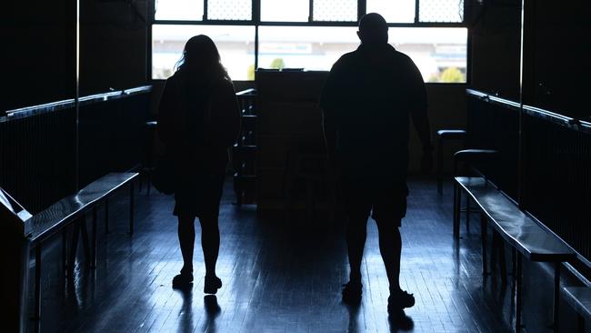 GHOST PATROL: Paranormal experts Deborah and John Christopher looking for ghosts at the Mackay Leisure Centre.