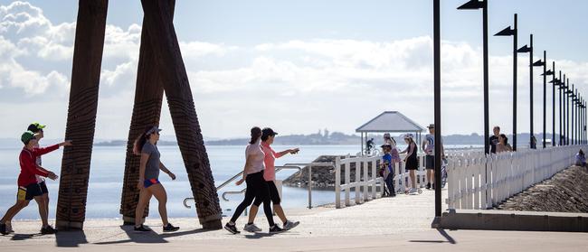 Wynnum foreshore has plenty of people out and about yesterday at 9am to exercise. Picture: Sarah Marshall